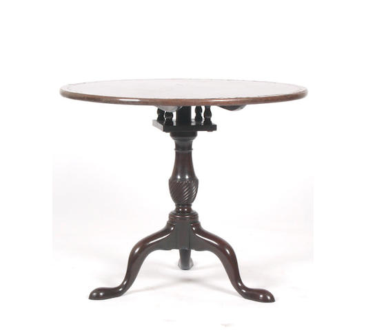 A George III mahogany snap top table