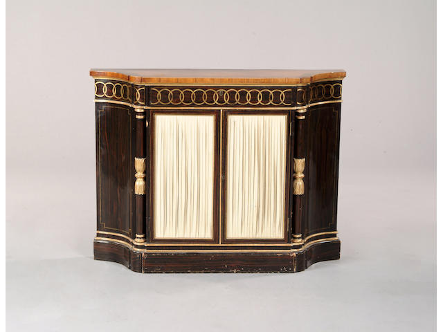 A Regency satinwood, faux rosewood and parcel gilt side cabinet