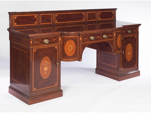 A late Victorian mahogany and marquetry inlaid breakfront sideboard,