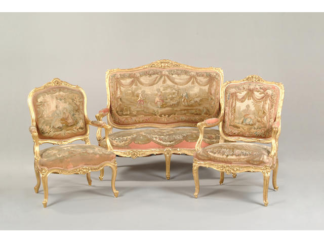 A late 19th century French matched gilt salon suite