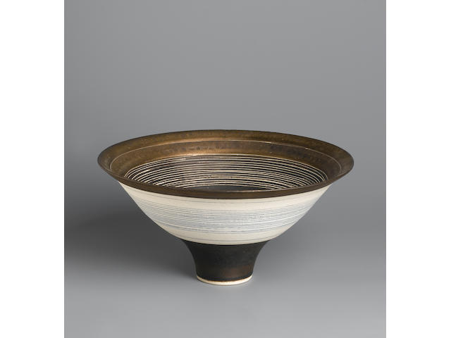Dame Lucie Rie a footed Bowl with inlaid and incised circles, circa 1970 Diameter 9in. (23cm)