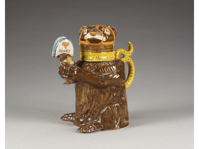 A Pratt Ware Napoleonic 'Bear Baiting' jug and cover, circa 1800,