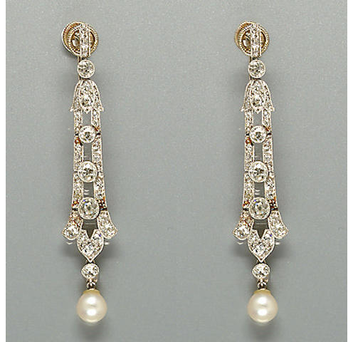 A pair of early 20th century diamond and pearl earpendants,
