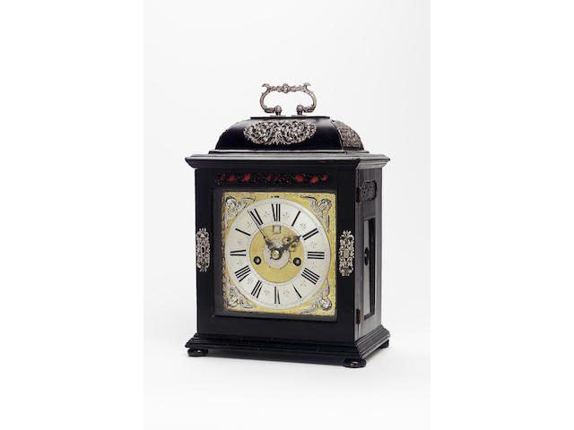 A fine and rare late 17th century silver mounted ebony veneered bracket clock with alarm and pull quarter repeat Fromanteel, London