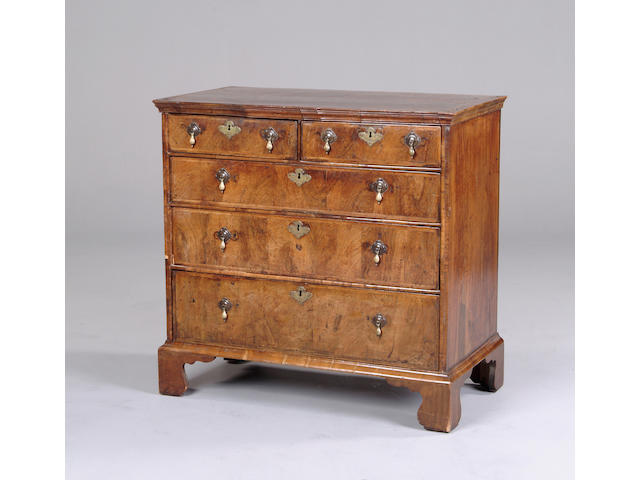 An 18th century walnut and featherbanded chest of drawers