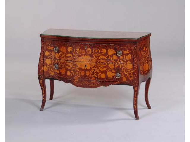 A 19th century Dutch rosewood and floral marquetry serpentine commode