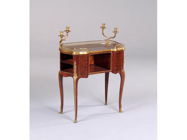 A late 19th/early 20th century kingwood, parquetry and gilt metal mounted table &#224; &#233;crire
