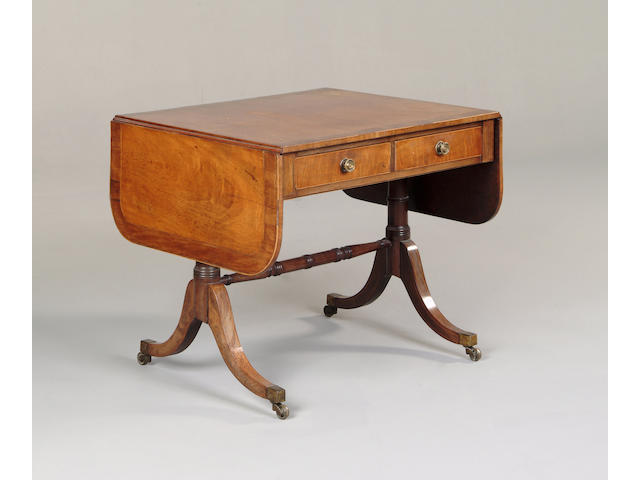 A Regency mahogany, harewood and crossbanded sofa table