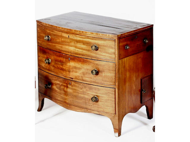 A late George III mahogany bowfront chest of drawers,