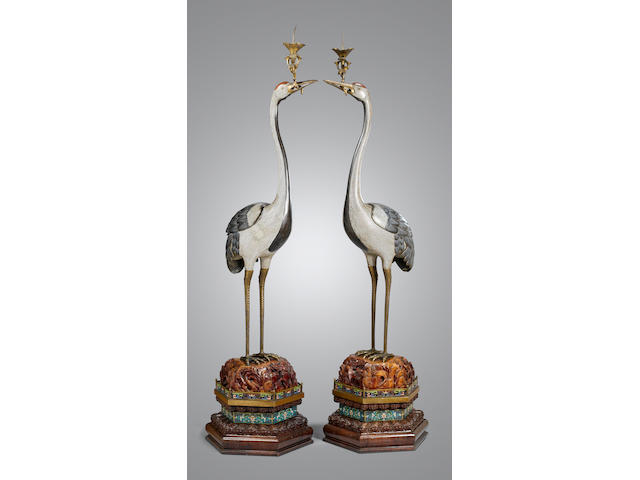 A rare and massive pair of cloisonn&#233; enamel standing 'crane' candle holders Jiaqing/Daoguang