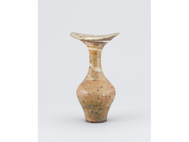 Dame Lucie Rie a tall Vase with integral spiral, circa 1976 Height 12 3/8in. (31.5cm)