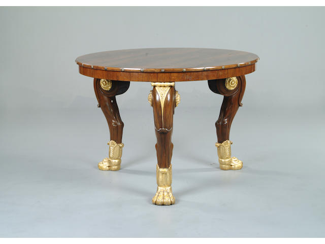 A rosewood and gilt centre table