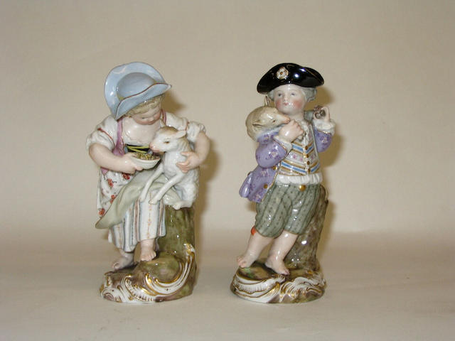 A pair of Meissen figures of a shepherd and shepherdess