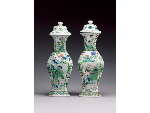 An attractive pair of associated famille verte vases;