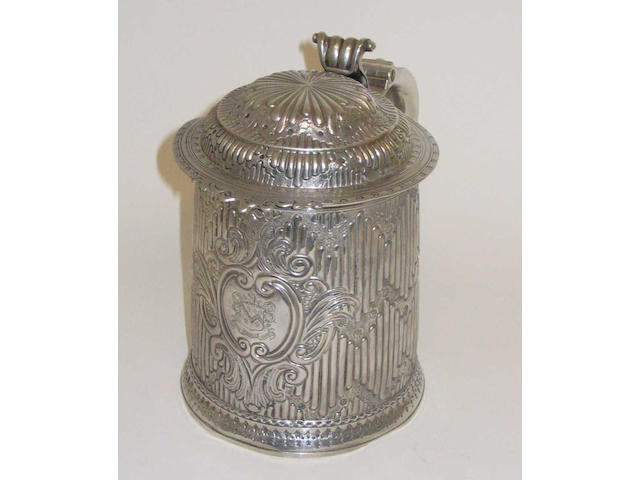 A Queen Anne tankard By John M. Stockar and Edward Peacock, 1709,