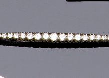 A diamond line bar brooch,