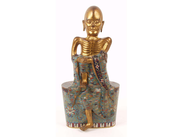 An early 20th Century cloisonne figure of an emaciated lohan