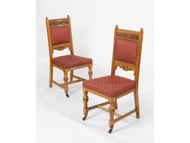 A set of twenty-nine late Victorian oak dining chairs,