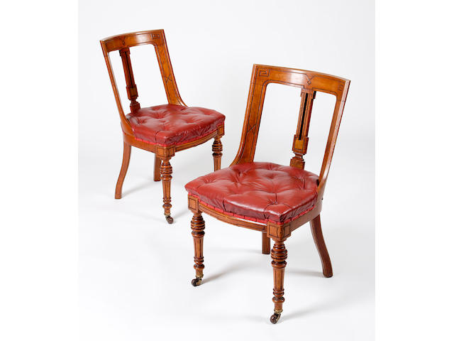 A set of twenty-three Victorian oak Trafalgar chairs,