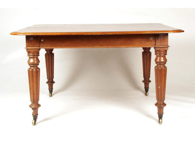 A William IV mahogany extending dining table