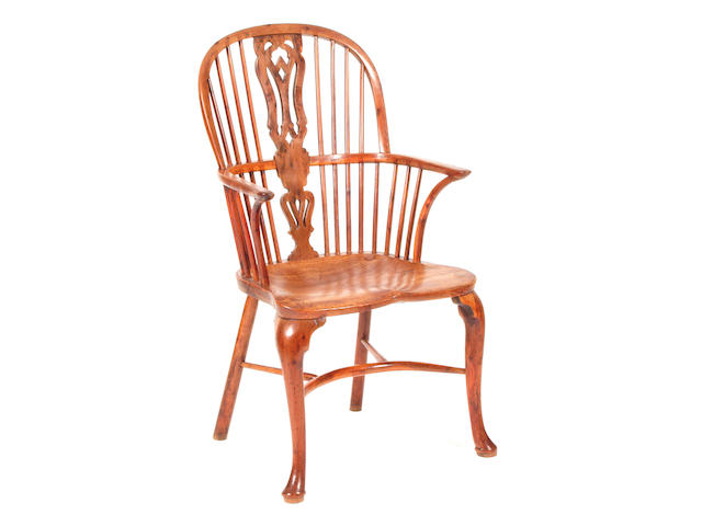 A 19th Century yew and elm Windsor elbow chair