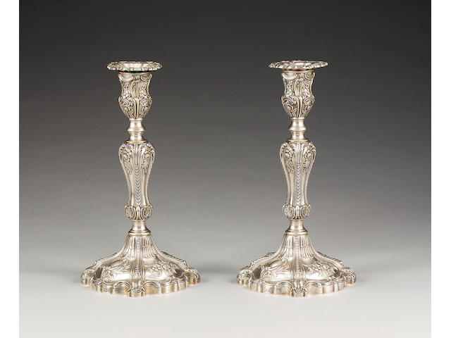 An Edwardian pair of silver candlesticks, by Hawksworth, Eyre Co. Ltd., Sheffield 1902,