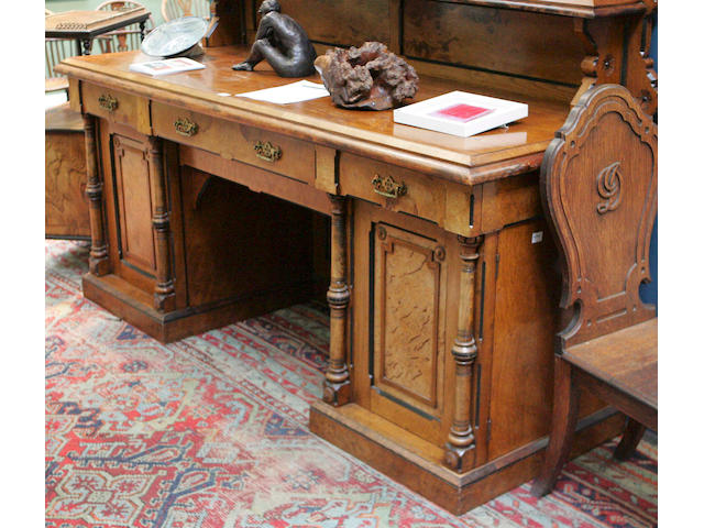 A large Aesthetic movement pollard oak sideboard