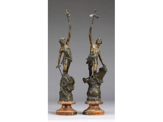 A pair of allegorical figures 'Automobilie' and 'Aviation' by Ferrand, circa 1907,