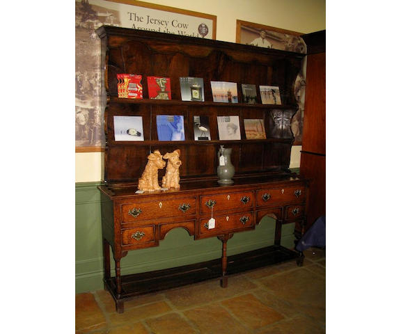 A late George III oak dresser