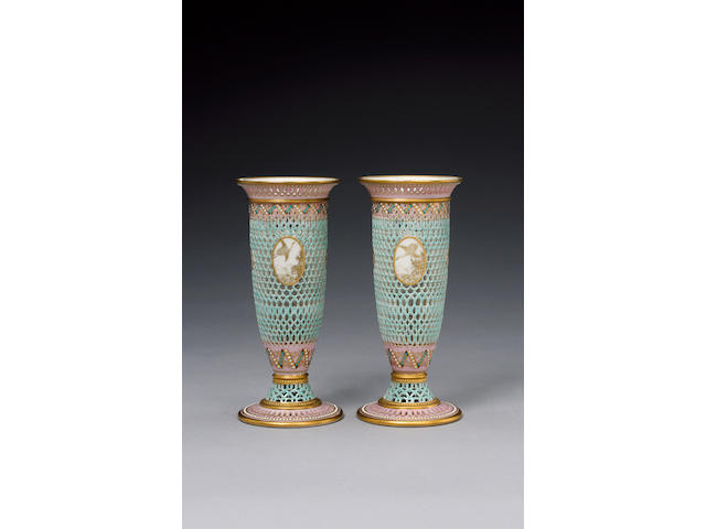 An important pair of Royal Worcester reticulated vases by George Owen dated 1889