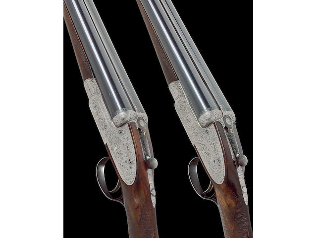 A pair of 12-bore self-opening sidelock ejector guns by J. Purdey, no. 16582/3 In their brass-mounted oak and leather case