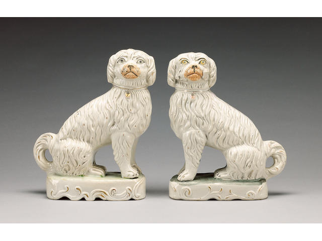 A pair of pipe smoking spaniels, circa 1850,