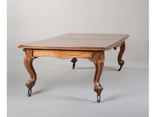 A Victorian mahogany large extending dining table