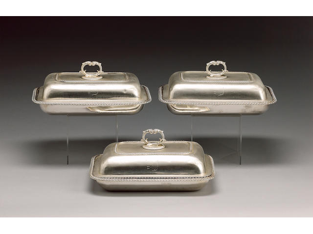 A George III set of three silver entr&#233;e dishes and covers, by Robert Garrard, London 1811,