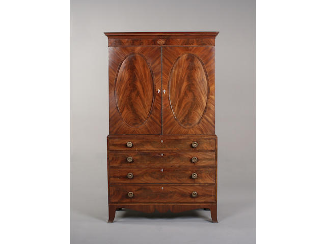 A Regency flame mahogany linen press