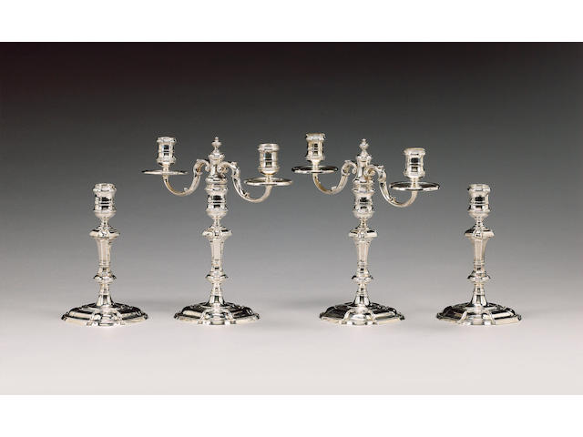 A modern silver pair of candelabra and a pair of candlesticks ensuite, by C. J. Vander, London 1970,