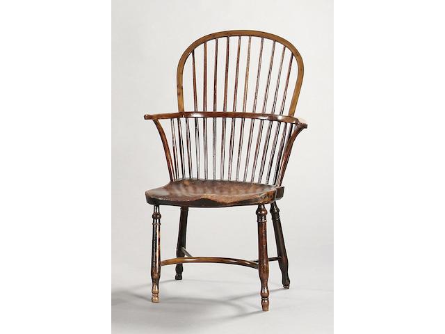 A 19th Century yew, ash and elm stick back Windsor armchair