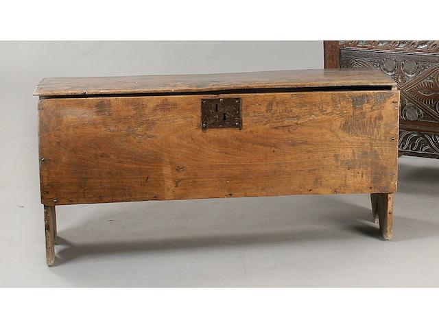 An early 18th Century elm six plank coffer