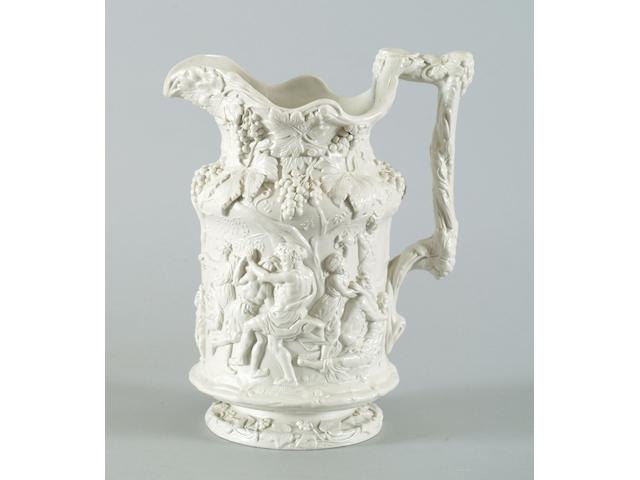 A Victorian relief moulded stoneware 'Bachanalian Dance' jug,