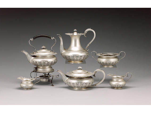 An Edwardian silver five piece tea and coffee service including a kettle on stand, by James Dixon & Son, Sheffield 1908 / 1909