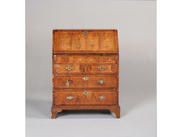 A small George II walnut bureau