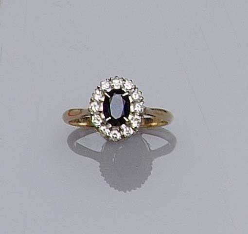 A sapphire and diamond oval cluster ring,