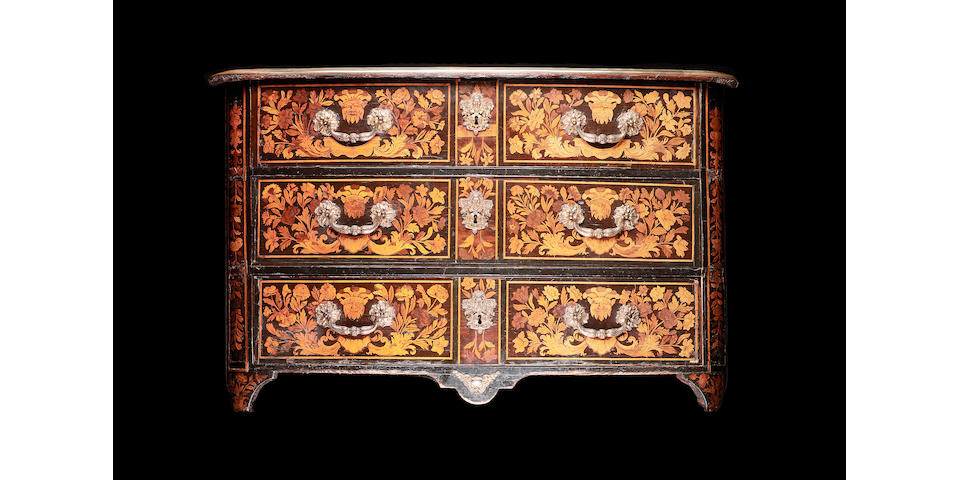 A R&#233;gence ebonised, sycamore, walnut and kingwood crossbanded floral marquetry Commode en arbal&#232;te in the manner of Auburtin Gaudron