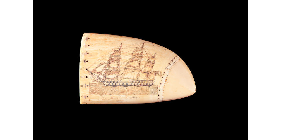 A rare scrimshawed sperm whale's tooth, attributed to Edward Burdett, circa 1825 Lenth 5in (12.8cm)