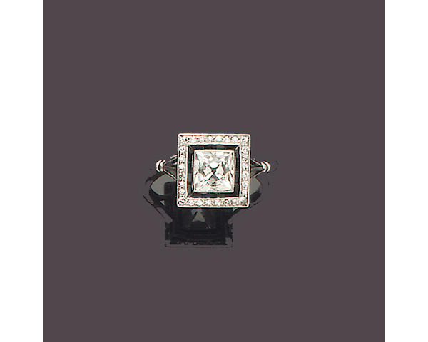 An art deco diamond and onyx ring,