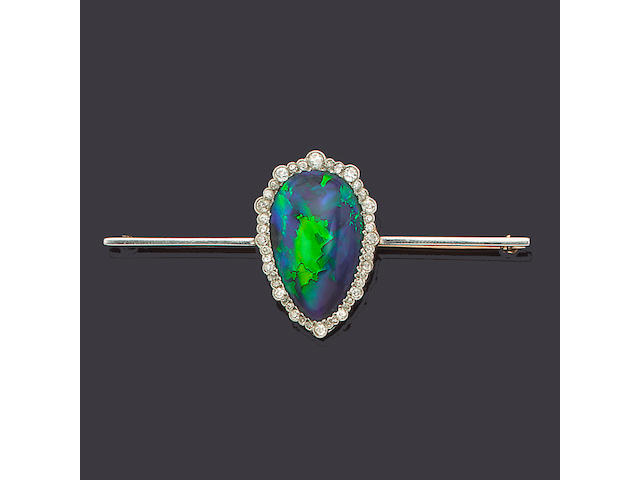 A belle &#233;poque black opal and diamond bar brooch,