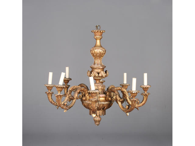 A large early 20th century Italian giltwood eight light chandelier