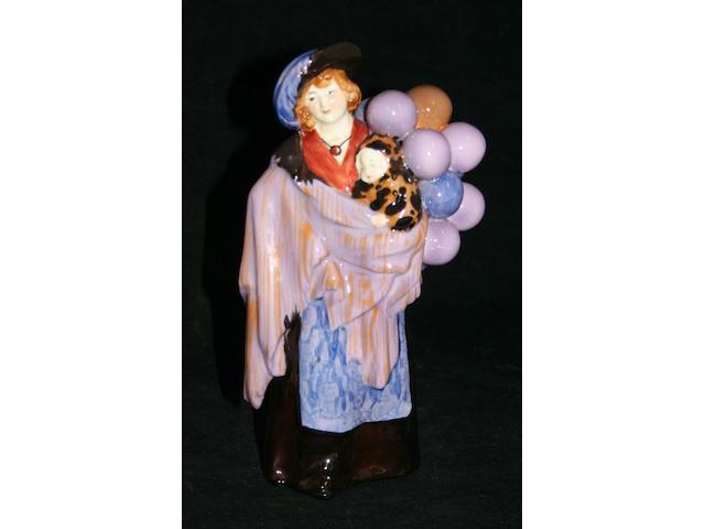 Figurines A Royal Doulton figure 'The Balloon Seller'