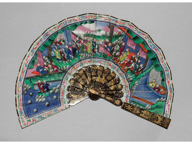A good mid-19th Century Chinese ivory and gold lacquer fan The guards with lacquer landscapes, birds and other motifs, the ivory sticks decorated to both sides in shaded gold lacquer with temple pagodas, figures, flowers and birds, 31cm.  See illustration
