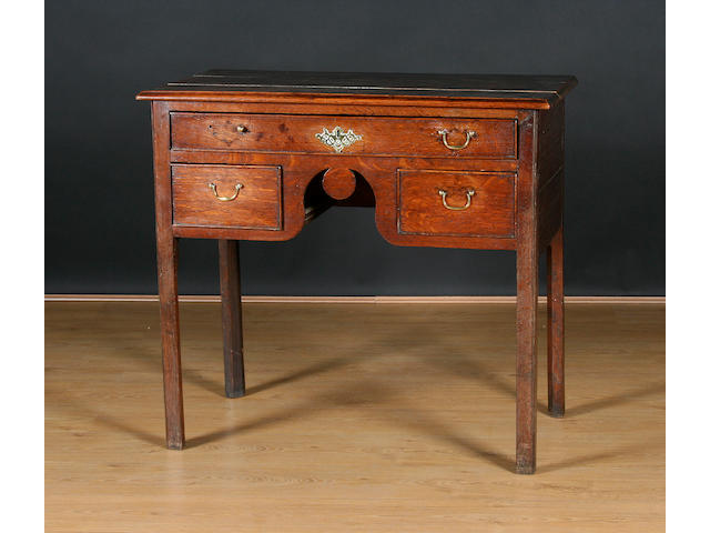 A late 18th Century oak lowboy